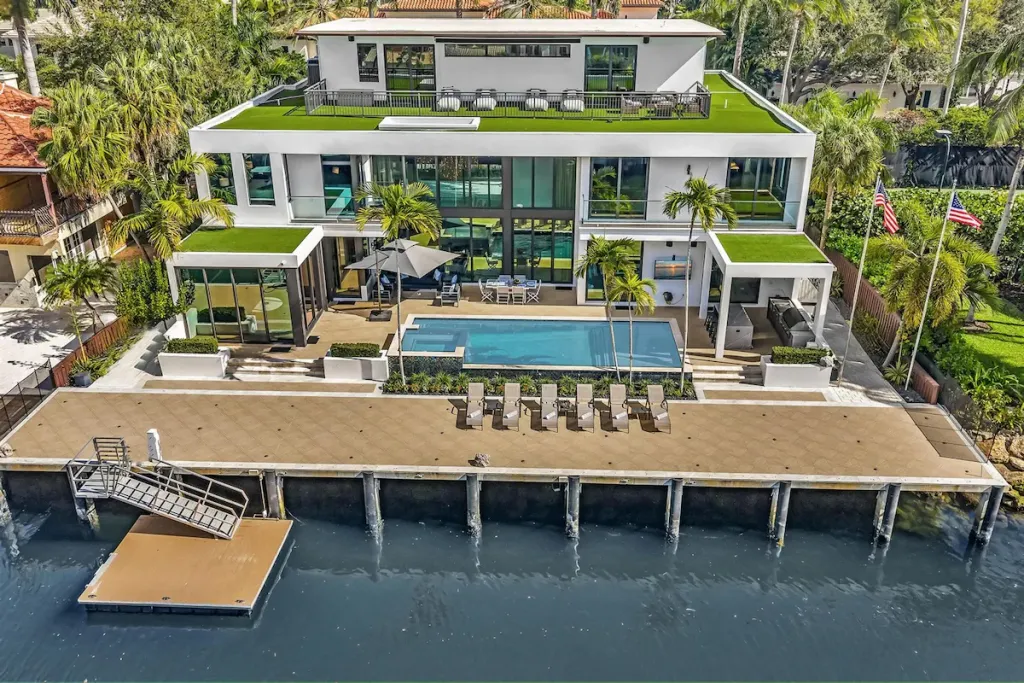 International buyers reviewing a luxury waterfront home build in South Florida