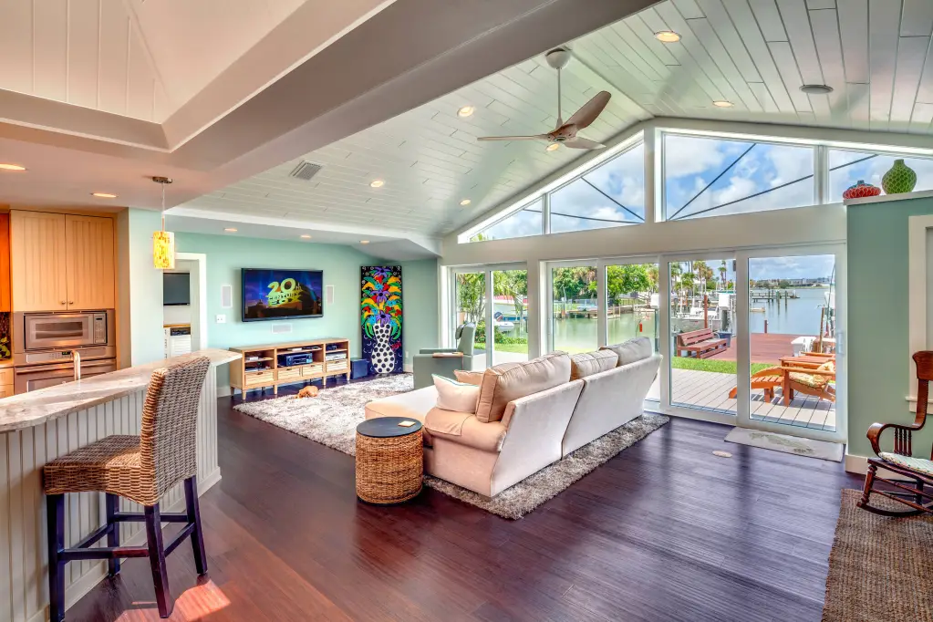Structural reconfiguration opening a floor plan in a luxury home