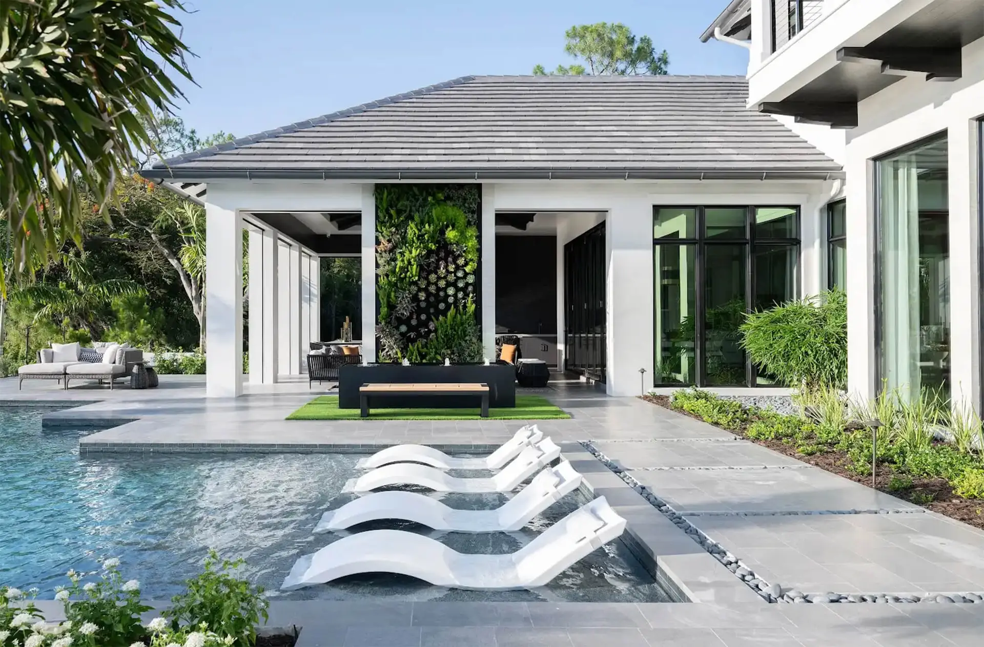 Modern luxury architecture in South Florida: clean lines, flat roof, and expansive glass