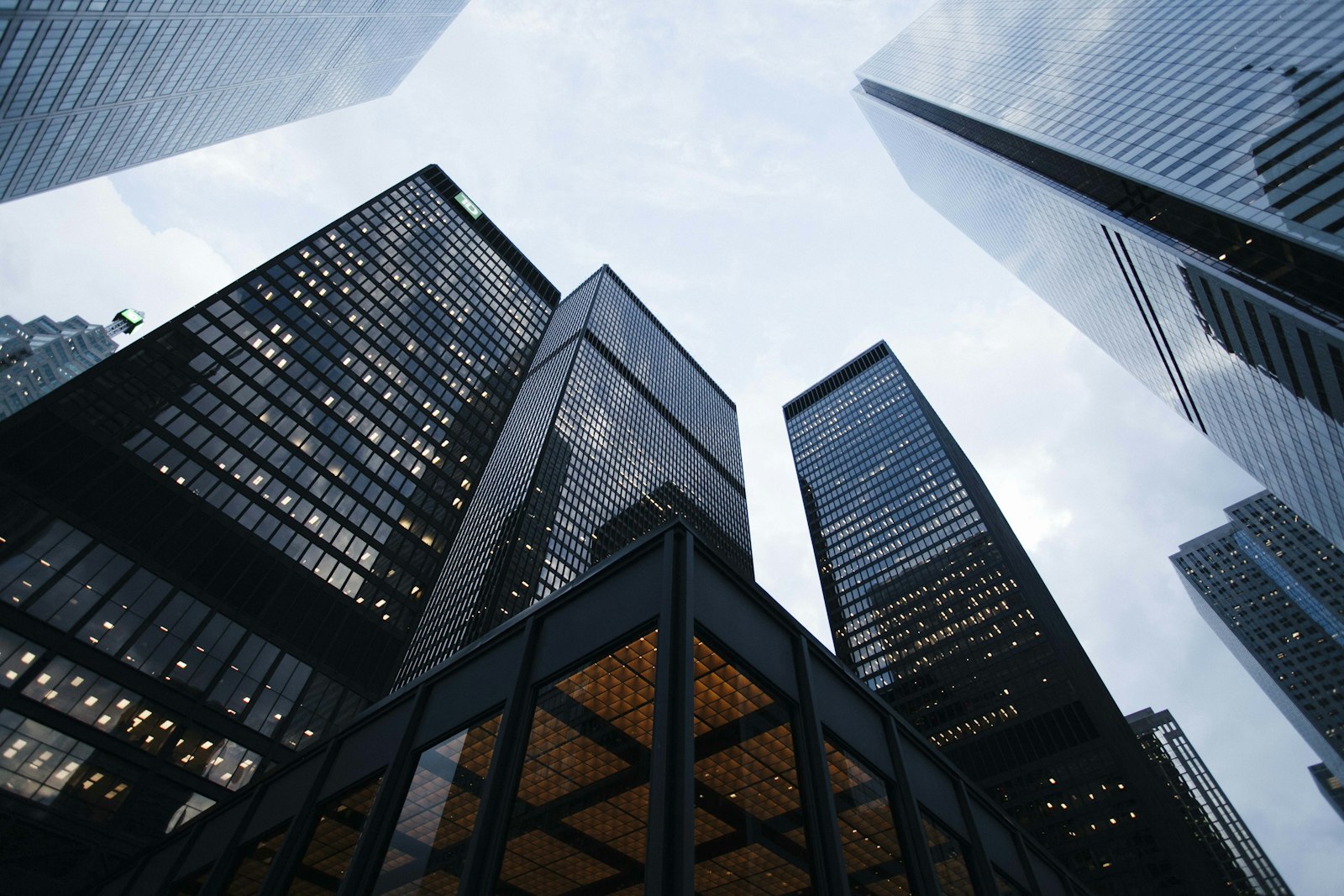 A modern bank building and skyline
