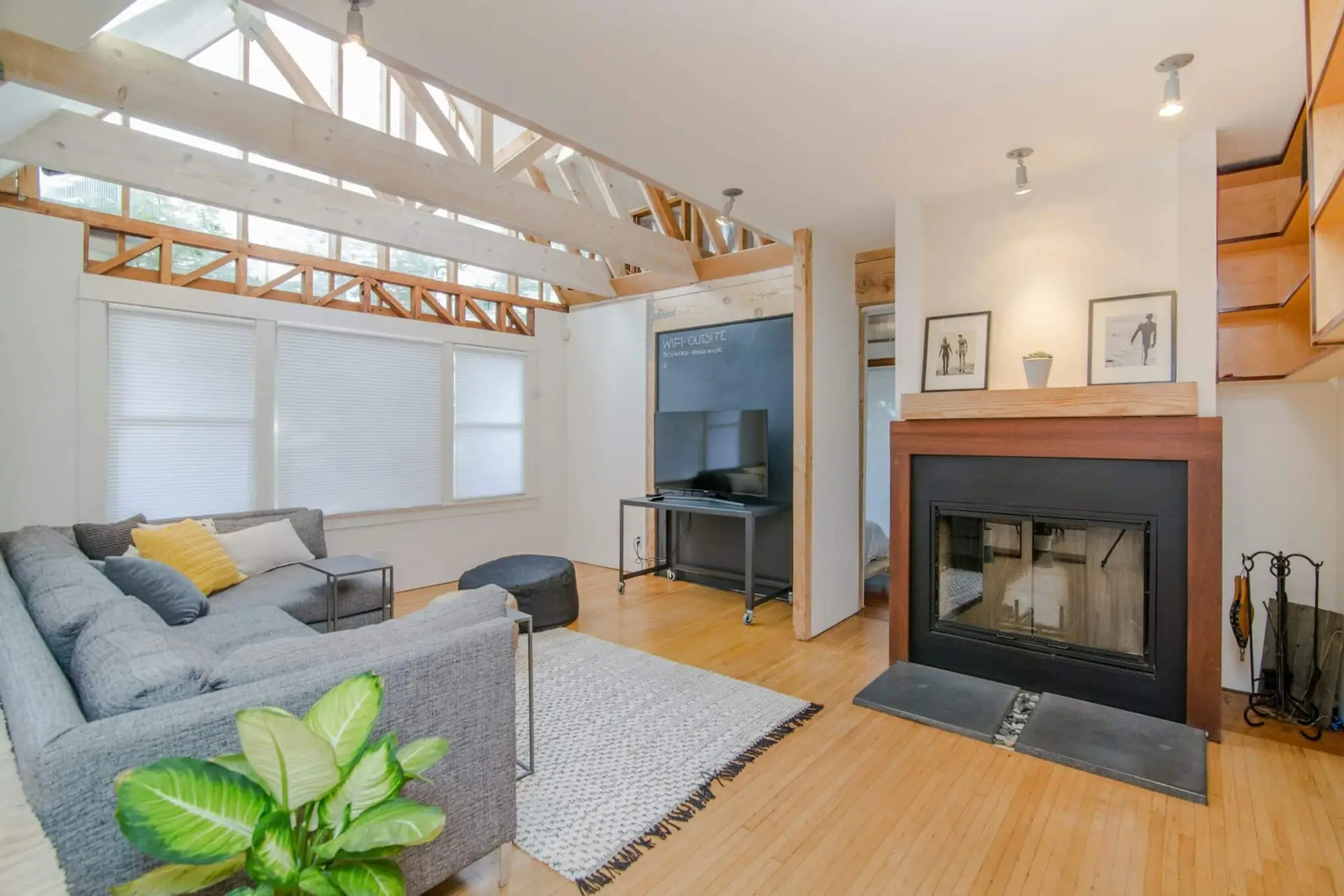 Architectural glazing framing an ocean view in a modern coastal home with biophilic design