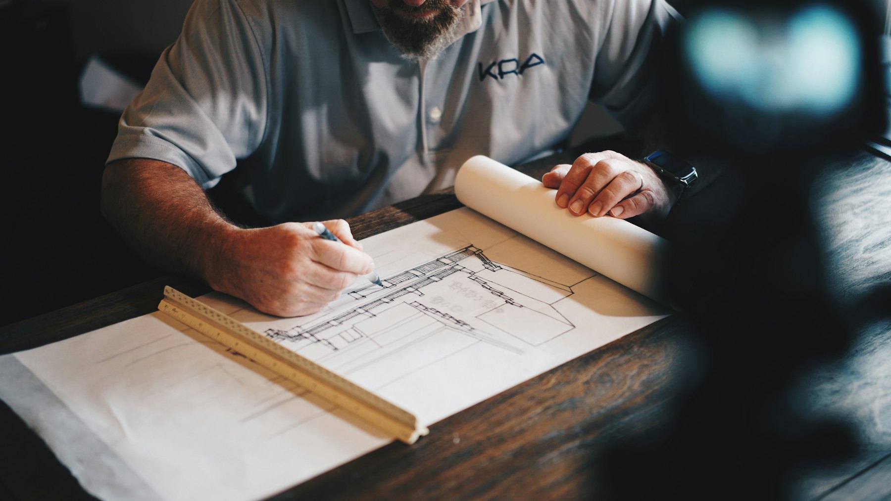 Architectural plans on a desk