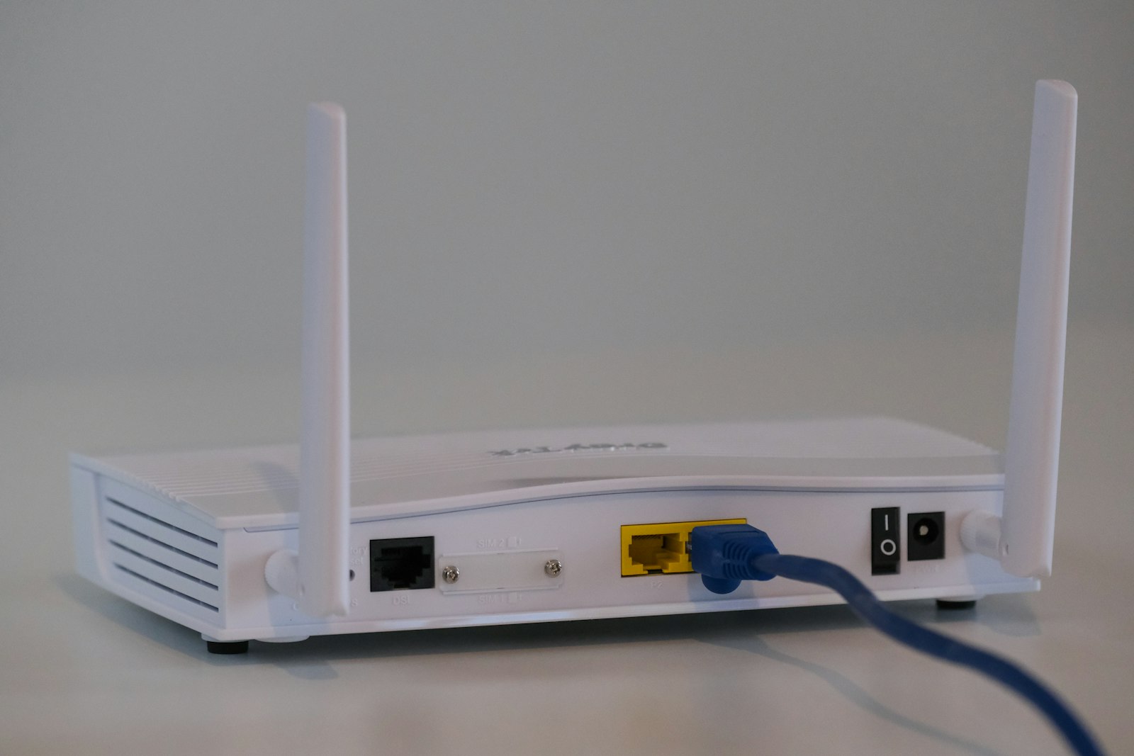 Ceiling-mounted Wi-Fi access point in a modern home