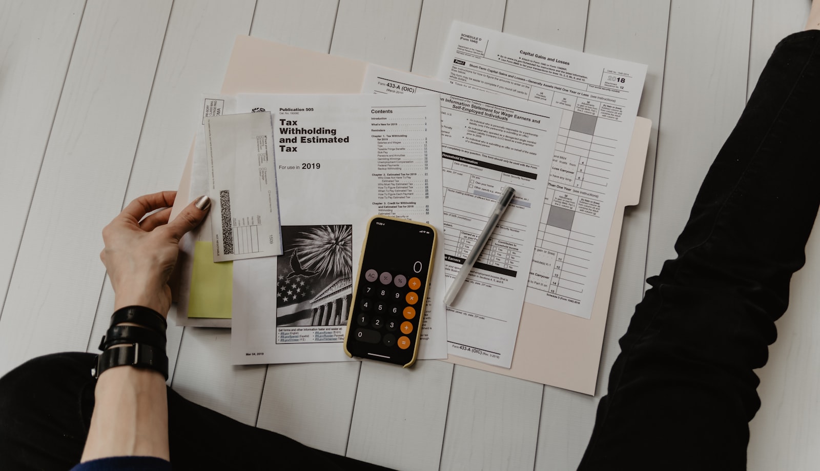 Checklist and documents on a construction management desk
