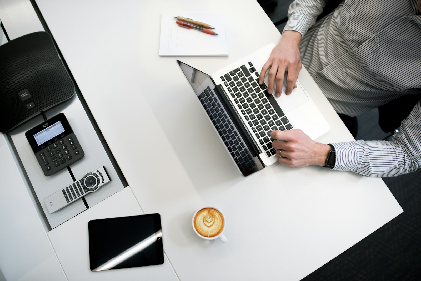 Permit and construction plan set on a desk