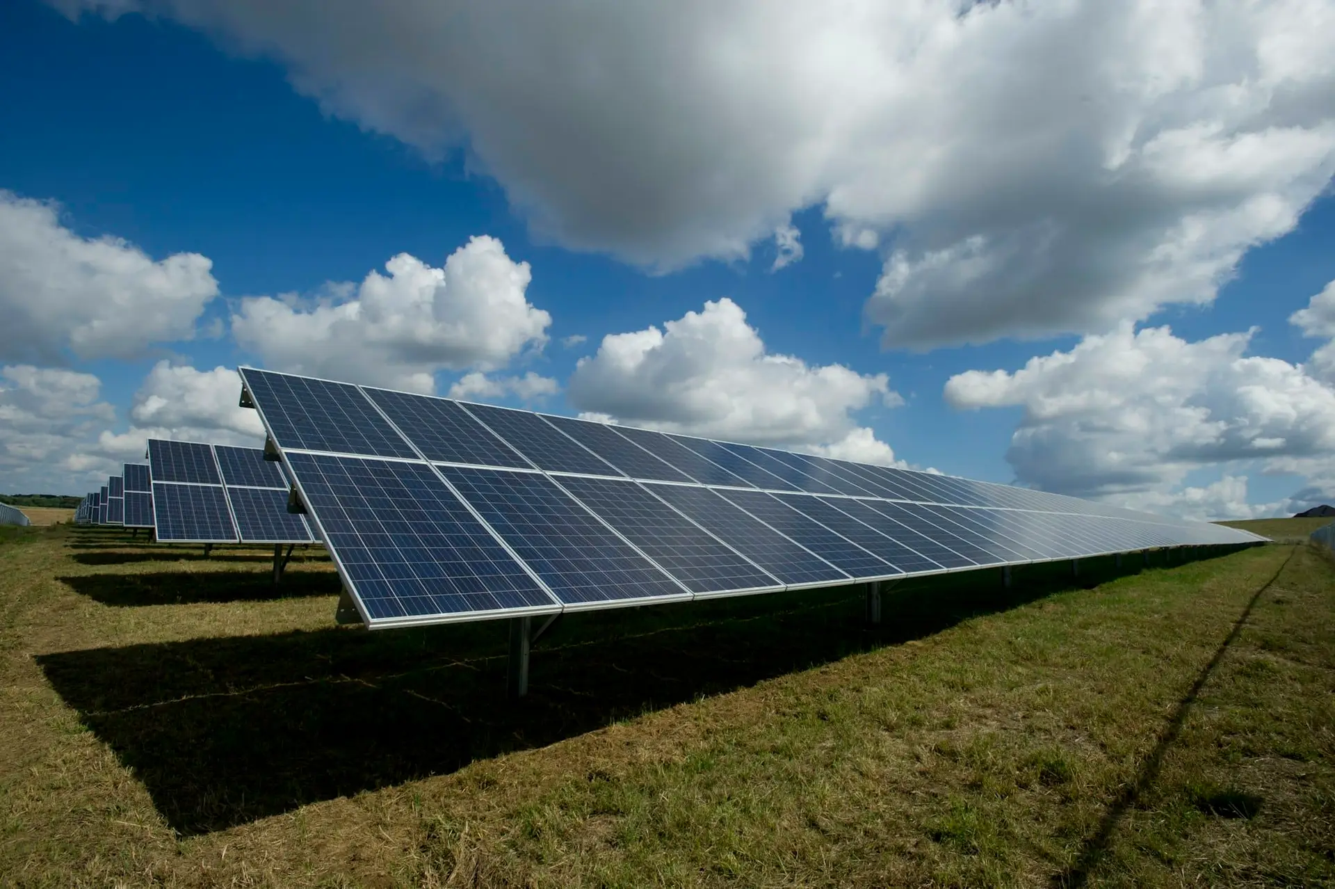 Energy management with rooftop solar on a modern coastal luxury estate