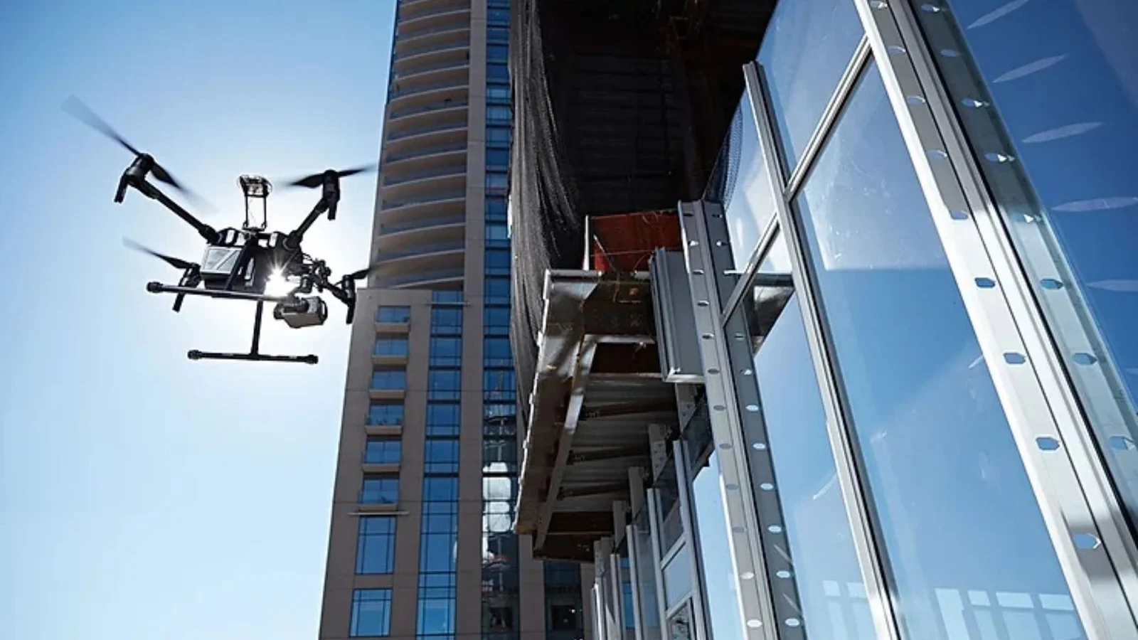 Remote Monitoring Technology for Owner's Representatives - 3 Drone flying above a coastal neighborhood