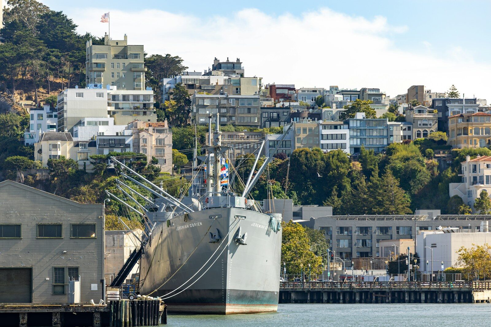 Environmental and Coastal Construction Permits Every Luxury Builder Needs - 2 A large ship docked in a city harbor.