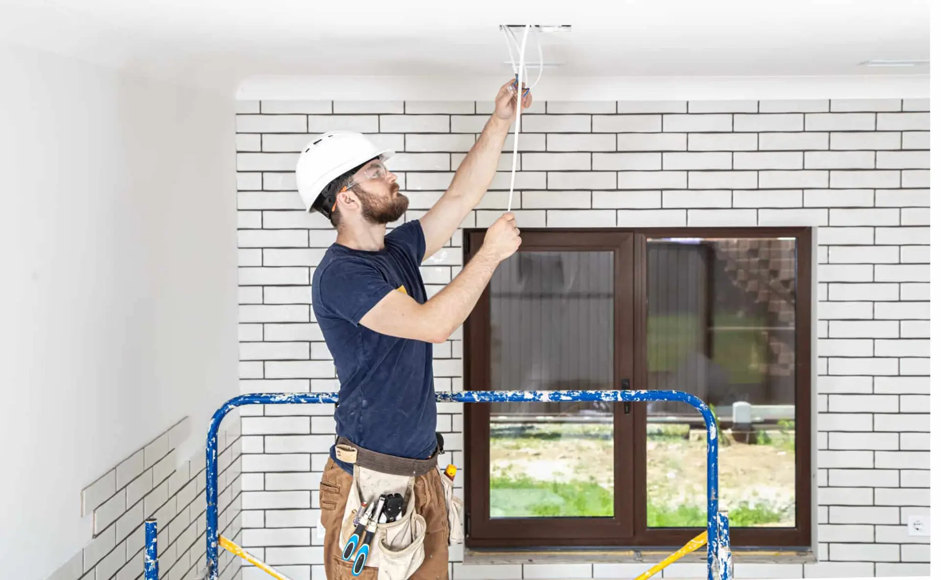 Builder team executing interior work In-house builder teams executing finishing work on a luxury home