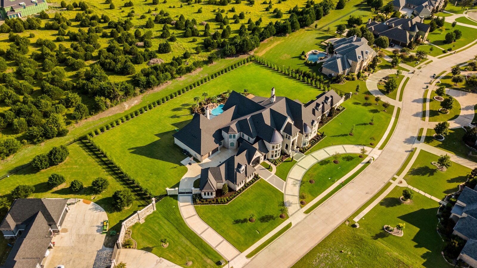 Best Luxury Custom Home Neighborhoods in Palm Beach County - 1 aerial photography of house with green yard