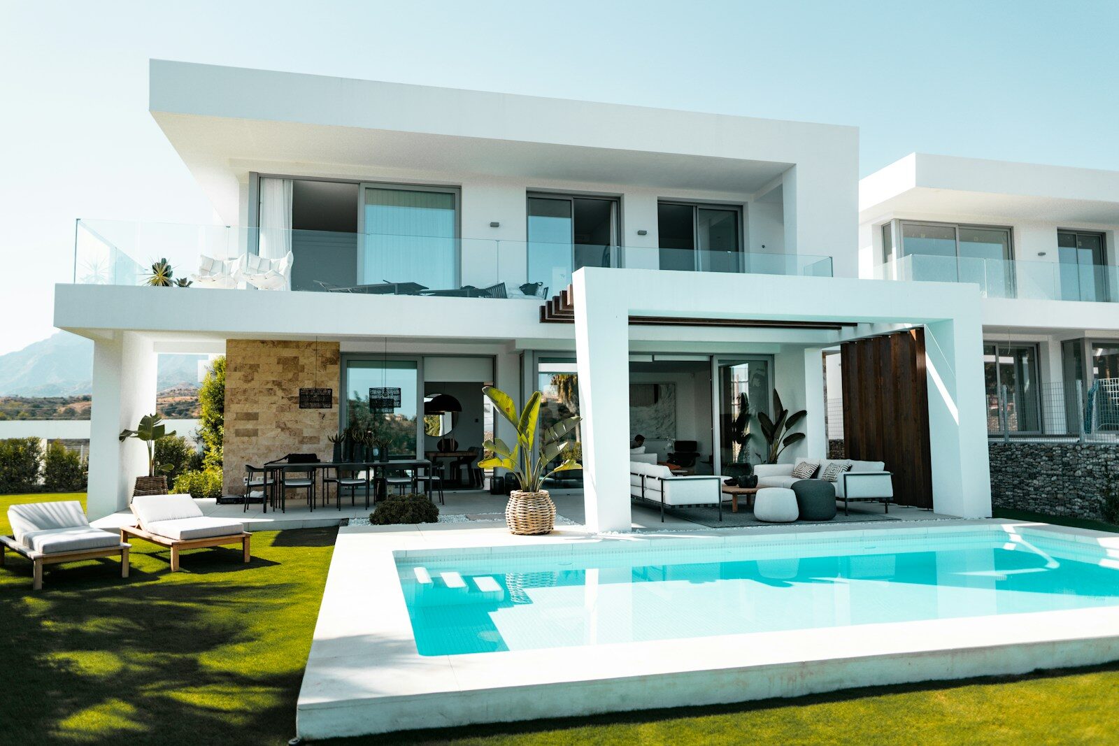 2026–2027 Luxury Real Estate & Construction Market Outlook – Tri-County Area - 2 white and blue concrete building