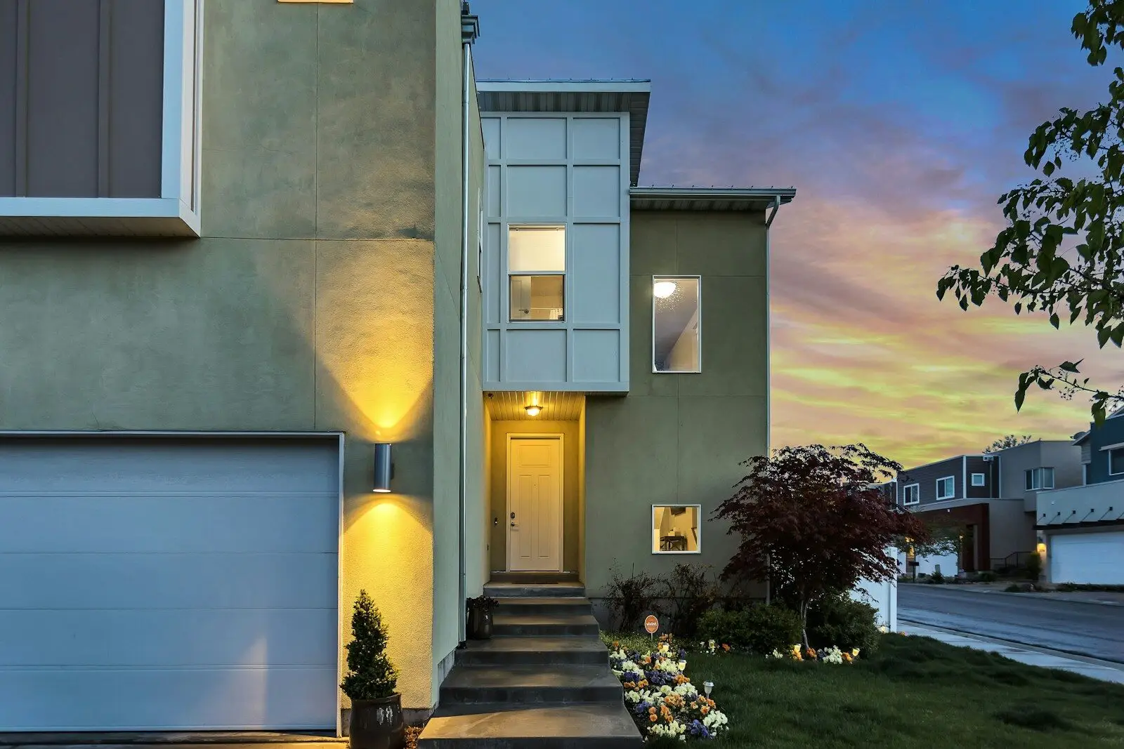 Advanced home security integrated discreetly into a luxury estate at night