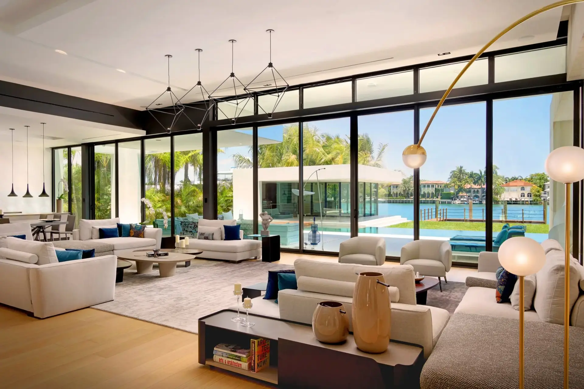 Natural stone and warm wood palette in a biophilic design luxury coastal interior